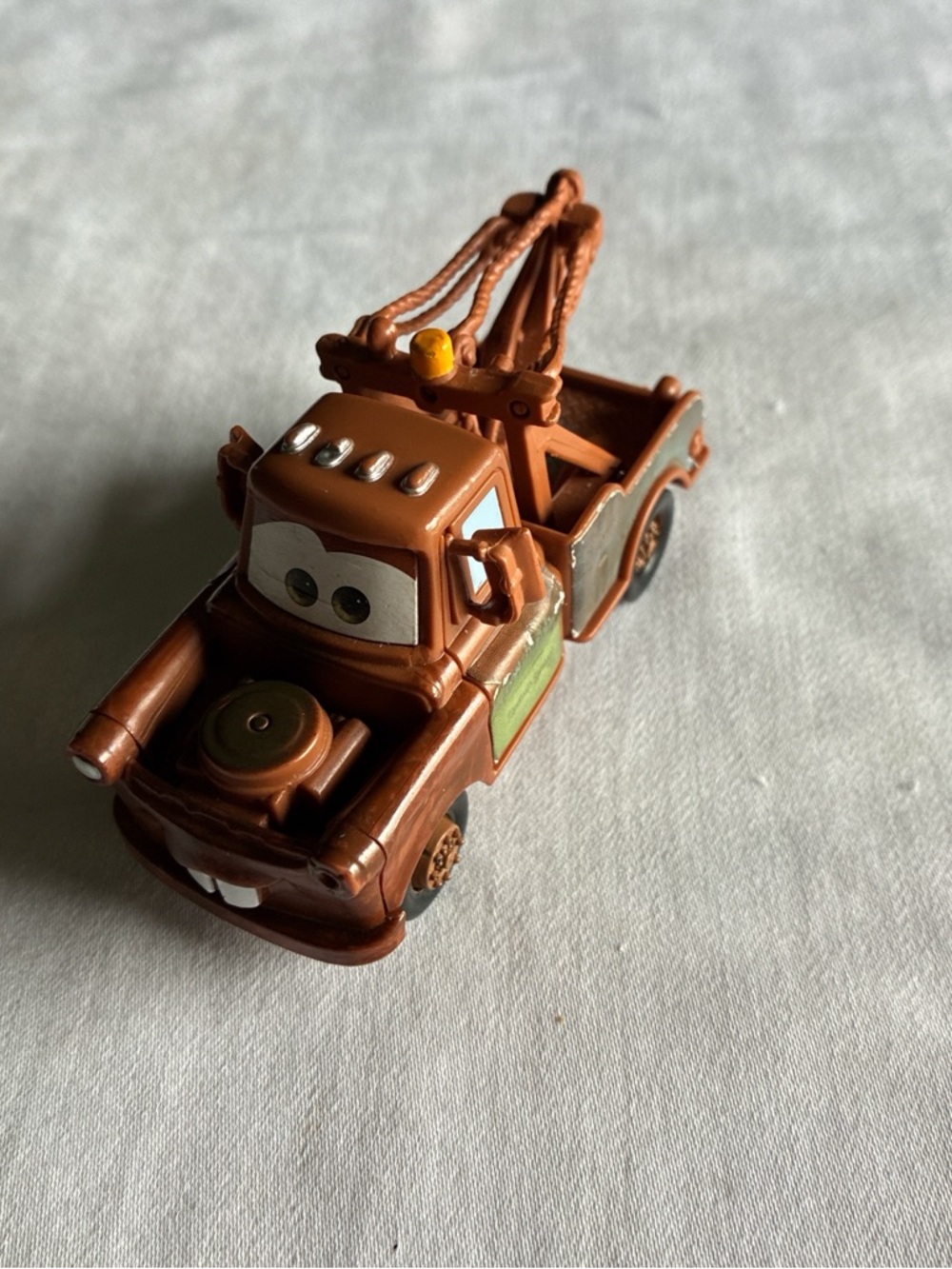 Disney Brown Tow Truck Toy with Yellow Light